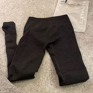 New, came ripped at butt scrunch, could try to fix, never worn, black marl